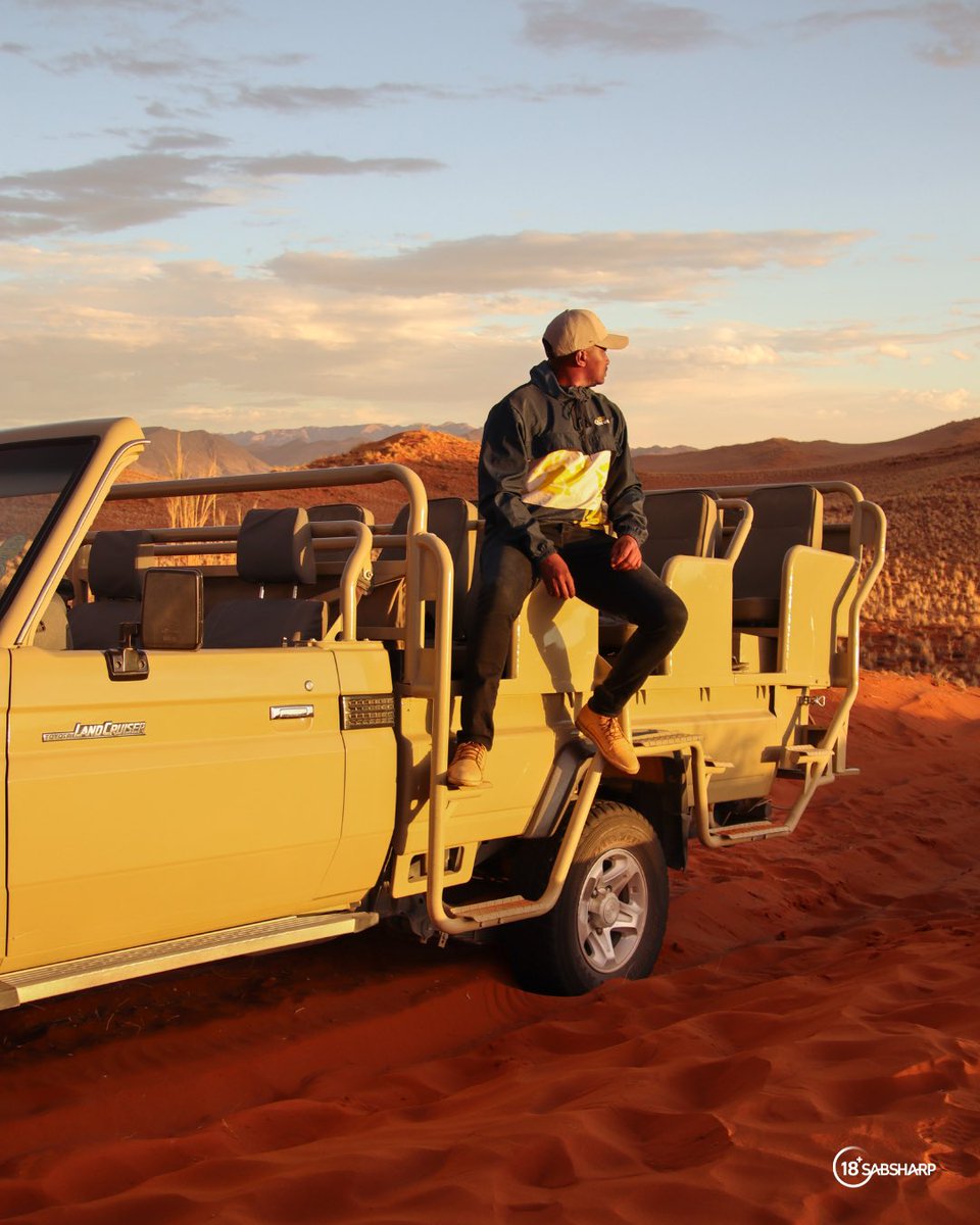 Tebogo_PinPin's tweet photo. Namibia sunsets don’t just paint the sky, they pause time. Shades of bright orange and pink melting into the desert horizon, silence all around, and a reminder that nature always has a way to slow you down. 🌅🇳🇦

#ThisIsLiving #ItsSunsetTime #ad https://t.co/dOda00QawD