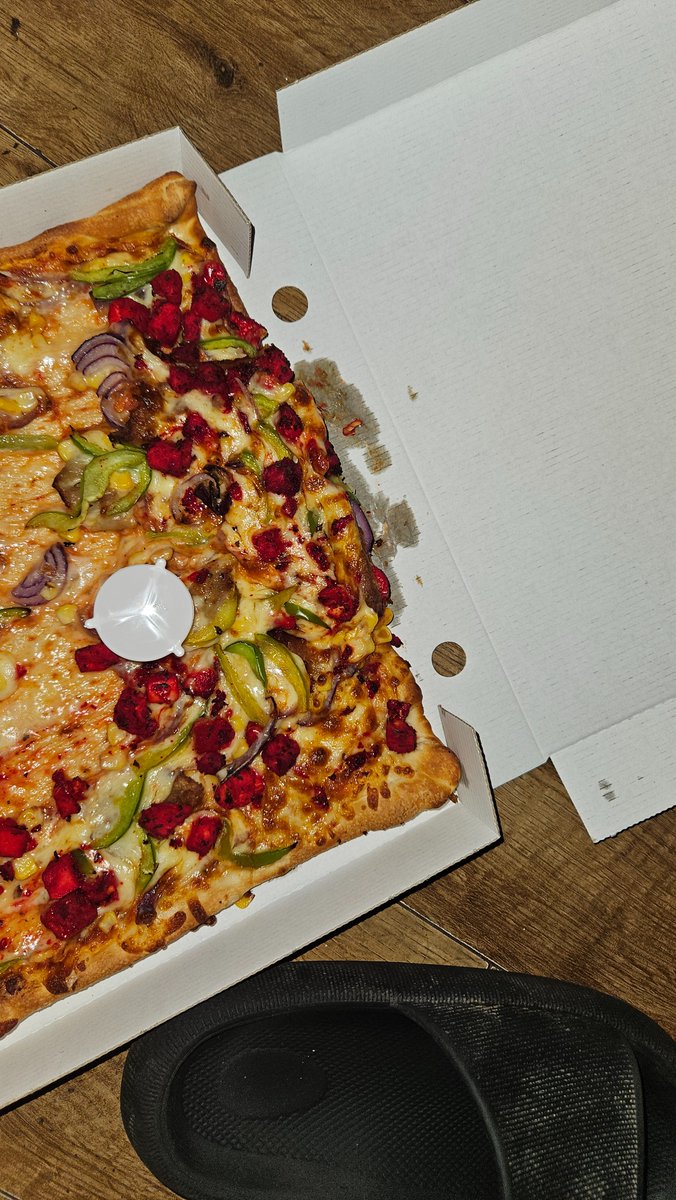 wareth1993's tweet photo. @ubereats_uk 
Ordered 2 pizzas and they came like this, but when I complained and send pics they said I wasn't eligible for refund,  also the dough tasted undercooked https://t.co/BgO1LAAdGj