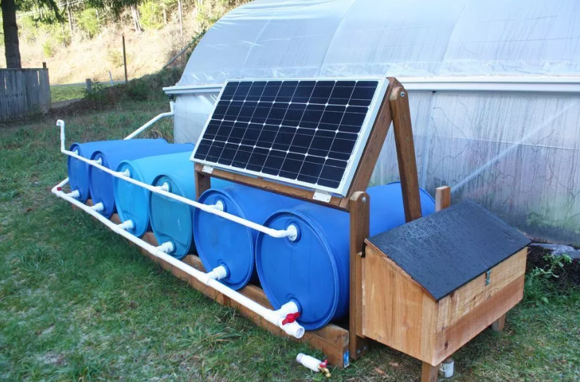 FoodscapingCo's tweet photo. We designed and built this polytunnel back in 2014, in Oregon.  It features 330 gallons of #water storage capacity and irrigation powered by a solar panel and batteries and is now part of our #ProjectLichen and like #ProjectLichen can be scaled up. https://t.co/7Q5rlpQ5pc