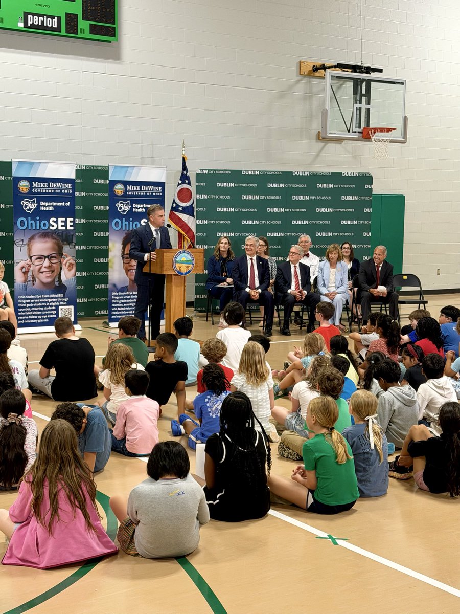 RepMikeCarey's tweet photo. It was great to join Governor DeWine and Administrator Oz at Hopewell Elementary School in Dublin today to watch the OhioSEE program in action. For too many young students, vision problems can stand in the way of learning, and this program is helping make sure kids in grades K-3 get the eye exams and glasses they need to succeed in the classroom.
 
OhioSEE's mobile vision clinics are bringing care directly to schools and helping families who may otherwise go without these important services. Seeing the students receive their new glasses today was a great reminder of the difference programs like this one can make.