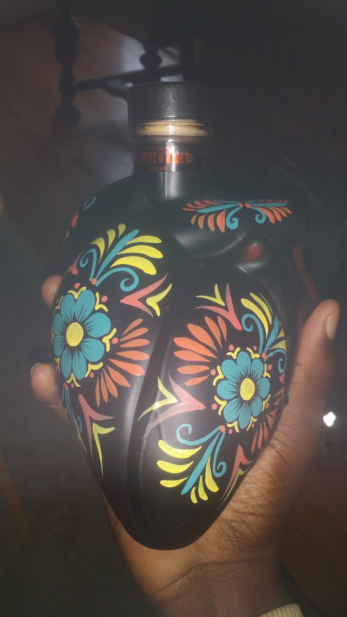 djpat5's tweet photo. @tommysotogeist I bought these a few years back for my nurse and my aunt for Christmas. They're tequila in heart shaped bottles. The black one is reposado and the painted one is anejo. There's a red one that's a blanco. https://t.co/4nQmGHQ6eP