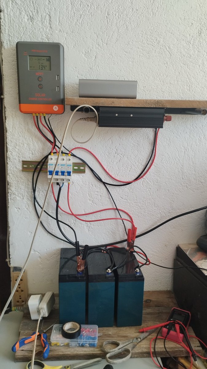kervsky's tweet photo. I tidied the wires with contact sleeves &amp; tried to make it look ok 😂 right now w/ 300w, system is eating 21-136w (mini ref, 2 fans, 10w usb), 136w is compressor on. I'm assuming 10h/day (7a-5p) 0.21-1.36 kwh (0.785 ave), 23.55/30 days = ₱337 savings/mo. ROI, gonna be awhile 😂 https://t.co/s9T4kZsCX0