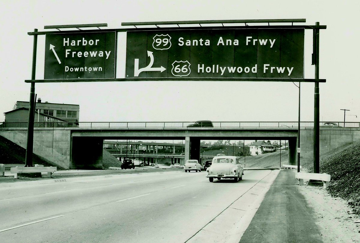 FreewaysLA's tweet photo. 1953-Nov-10 - Looking southerly at newly opened Arroyo Seco Pkwy (then US-6-66-99/CA-11, now CA-110) at Alpine St OC. Sunset Blvd OC and four level interchange in background. 

Note 1948 year of construction stamped on Alpine St OC [Bureau of Public Roads (BPR) photo].

1/2 https://t.co/9rXkfIN2R9