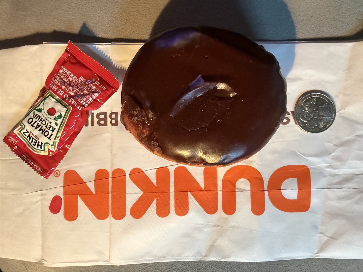 nicknelsonDUH's tweet photo. @dunkindonuts what’s up with this shinkflation?! $2.25 for a Boston crème smaller than a hockey puck?! https://t.co/17WZq6qJRV