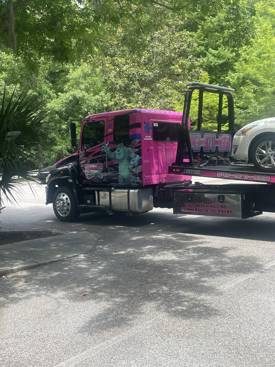 saltcircle222's tweet photo. today my car got towed in an autism awareness tow truck with sully on it https://t.co/z2f4VmMxNs