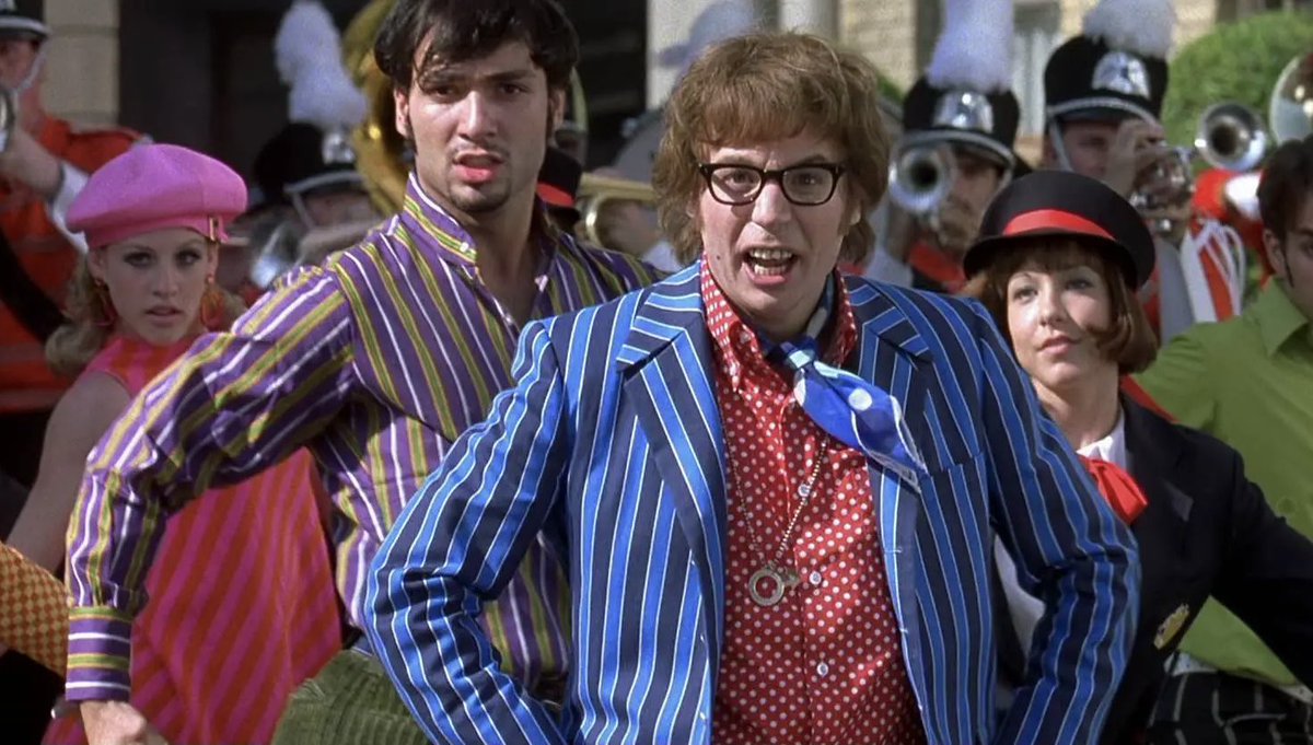 vhsbabe's tweet photo. i’ve been bothered by this cunty background dancer in Austin Powers since I was a kid and I have no clue why https://t.co/w7S9fdXIG2