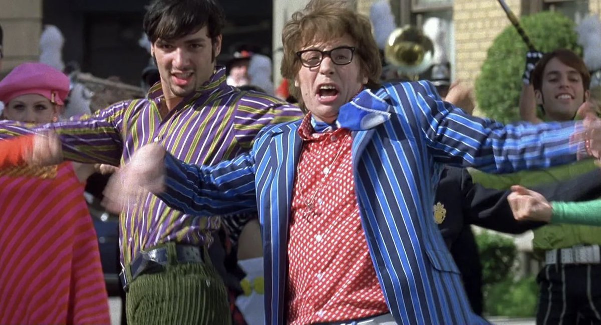 vhsbabe's tweet photo. i’ve been bothered by this cunty background dancer in Austin Powers since I was a kid and I have no clue why https://t.co/w7S9fdXIG2
