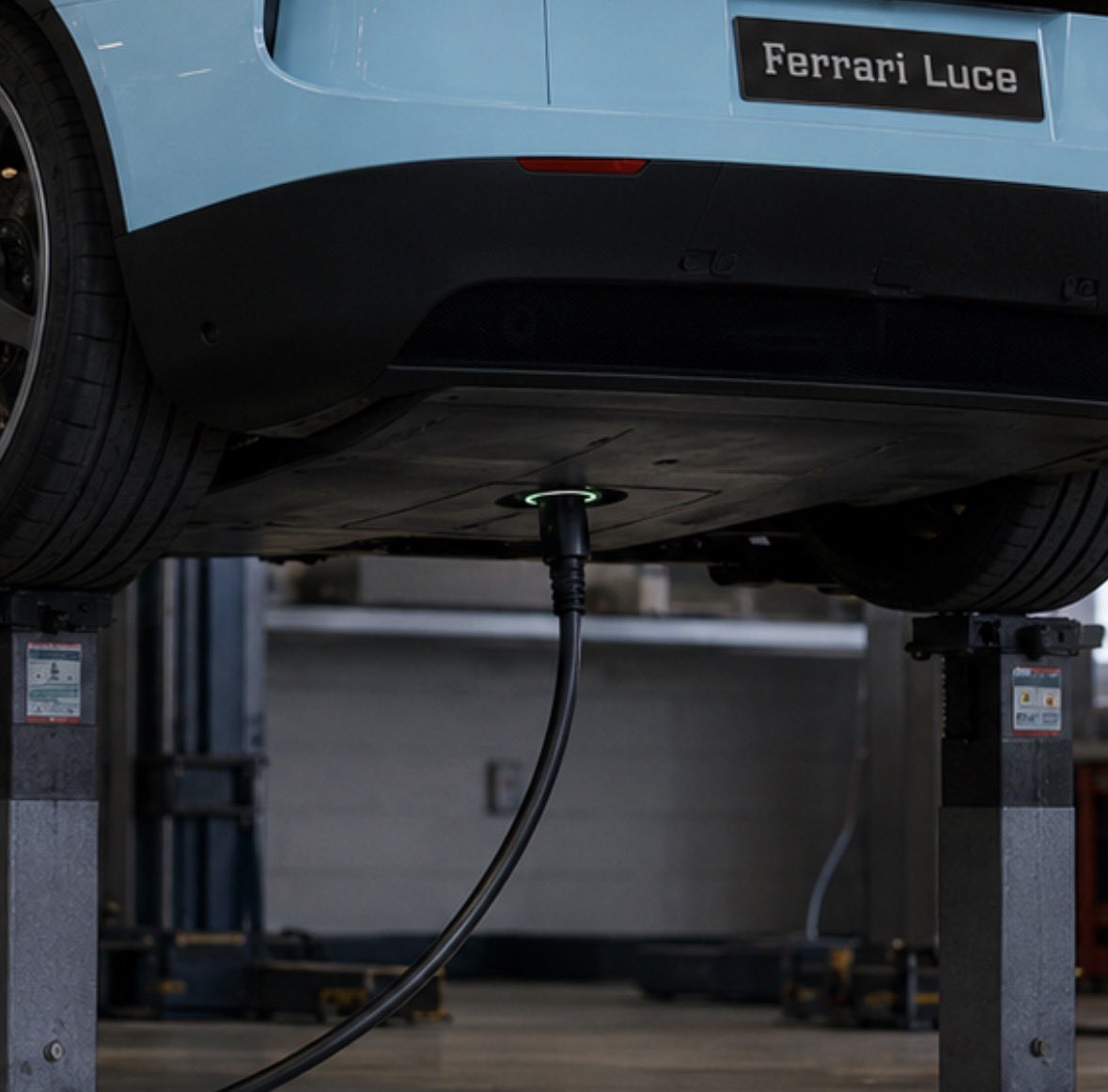 waitlessmess's tweet photo. No way they put the charging port underneath 💀😭 #ferrari #luce https://t.co/pBmWaerlws