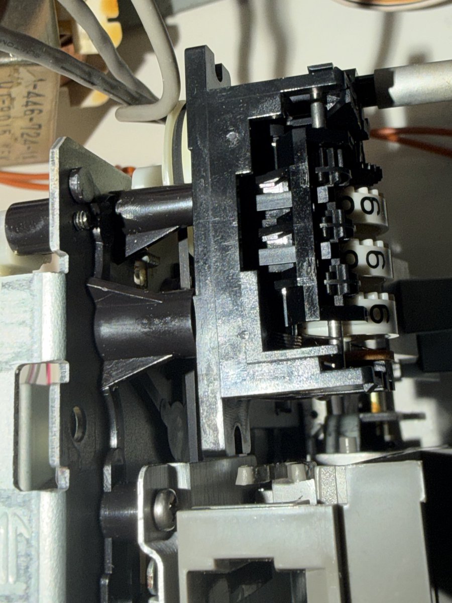 DisplacedGamers's tweet photo. Ok. Back at it after a week away. 

Belt 3 of 3 in place for tape counter. 
The ejection dampening cylinder… thing fell out while working on it a couple of weeks ago. Had to unscrew the mech and get it back into place without the belts slipping off the pulleys. Whew. https://t.co/dT0cAO9UEF