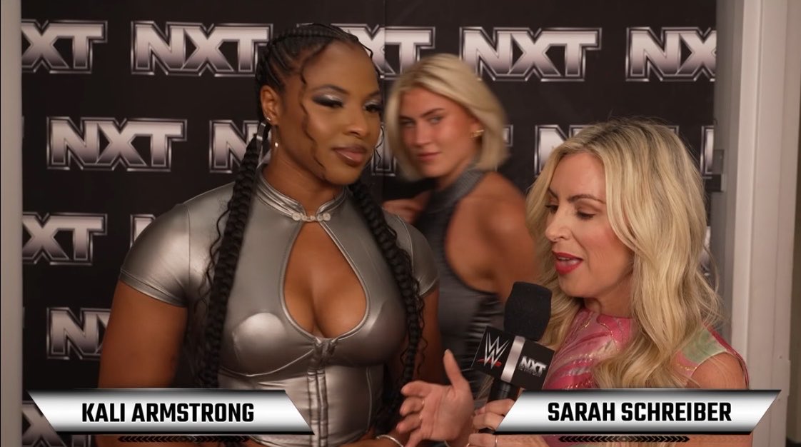 HouseofColors_'s tweet photo. Zena Sterling’s cameo on #WWENXT while Kali Armstrong was getting interviewed. We’re waiting! ⏳#WWE 

@zena_wwe 
@bullyray5150 https://t.co/Q30u4nTeUW