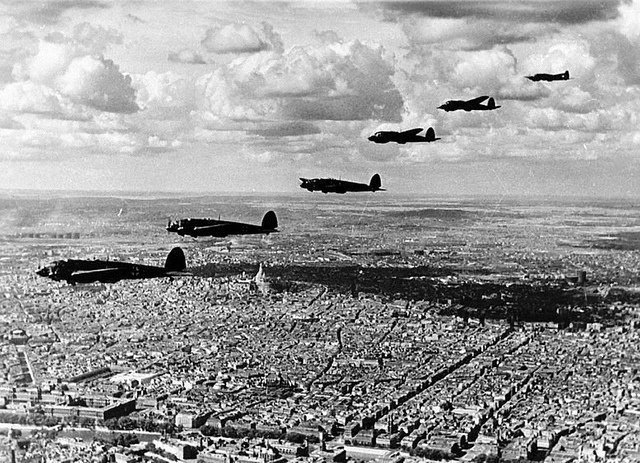 MilHistNow's tweet photo. On this day in 1940, Hitler’s Luftwaffe bombs Paris, killing 254 people — mostly civilians — in the first major air raid on the city. Ten days later, the French government declares Paris an “open city” to avoid further destruction as German forces close in. https://t.co/aR7ifObqK4