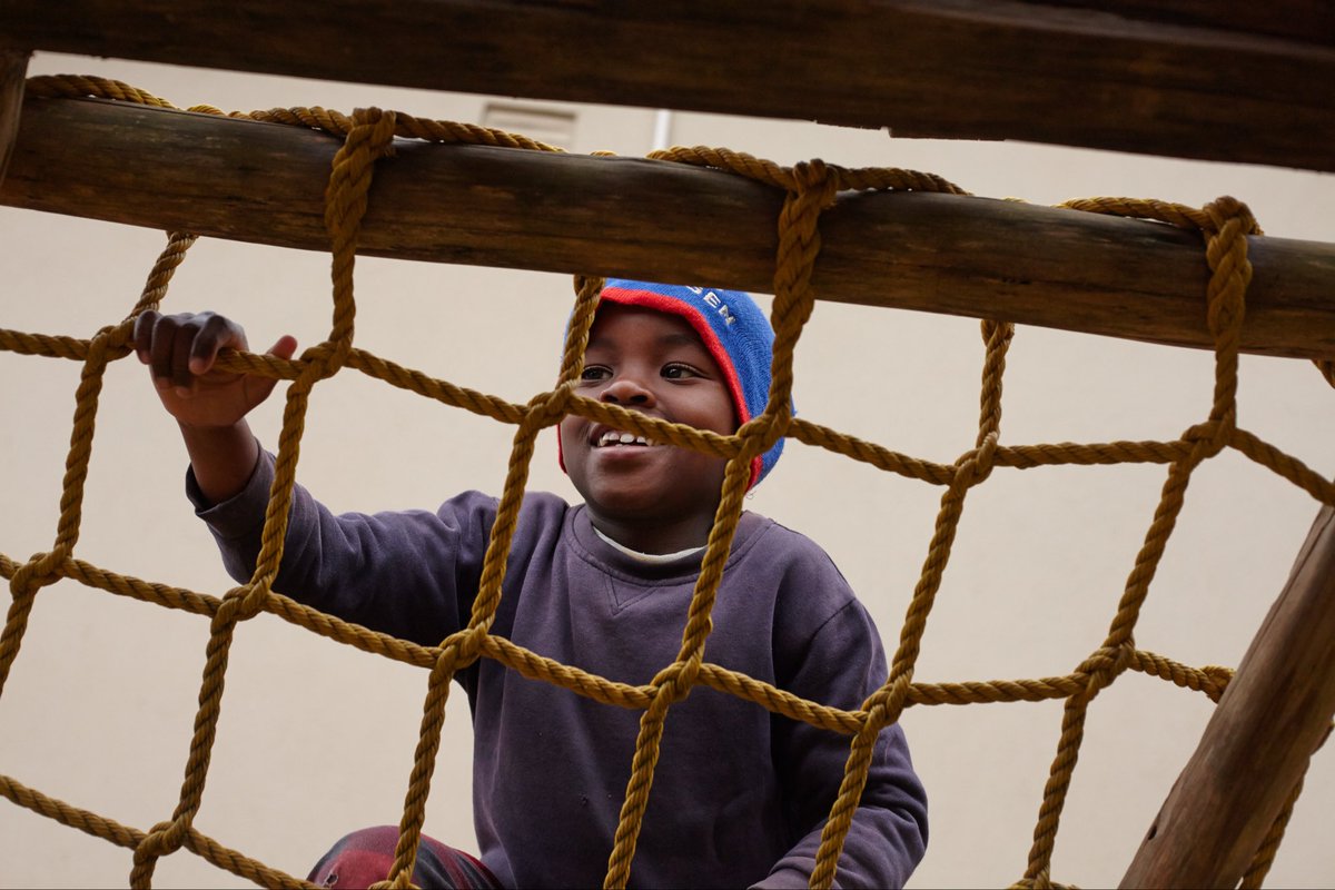 Bulembu's tweet photo. Playtime is the best time! Love seeing this guy conquer the climbing net today. So grateful for safe spaces where our kids can just be kids. 🇸🇿💙

#Bulembu #Eswatini https://t.co/BZZ943hxmH