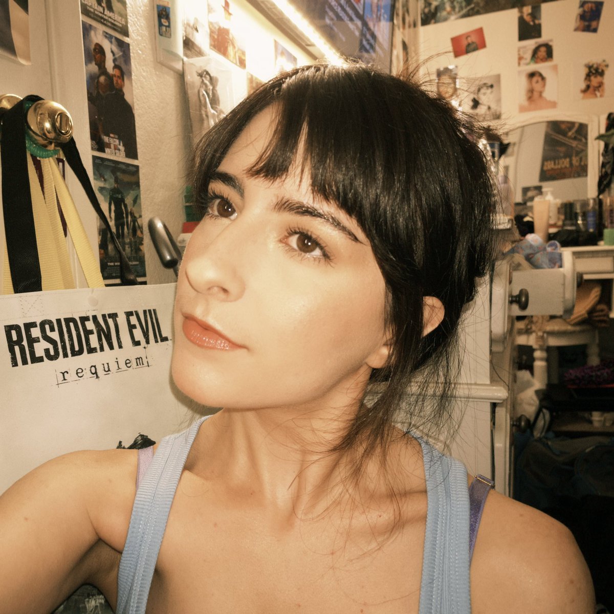 lizzyisalizard's tweet photo. the resident evil tote in the back was a paid actor https://t.co/XdR1bItU5b