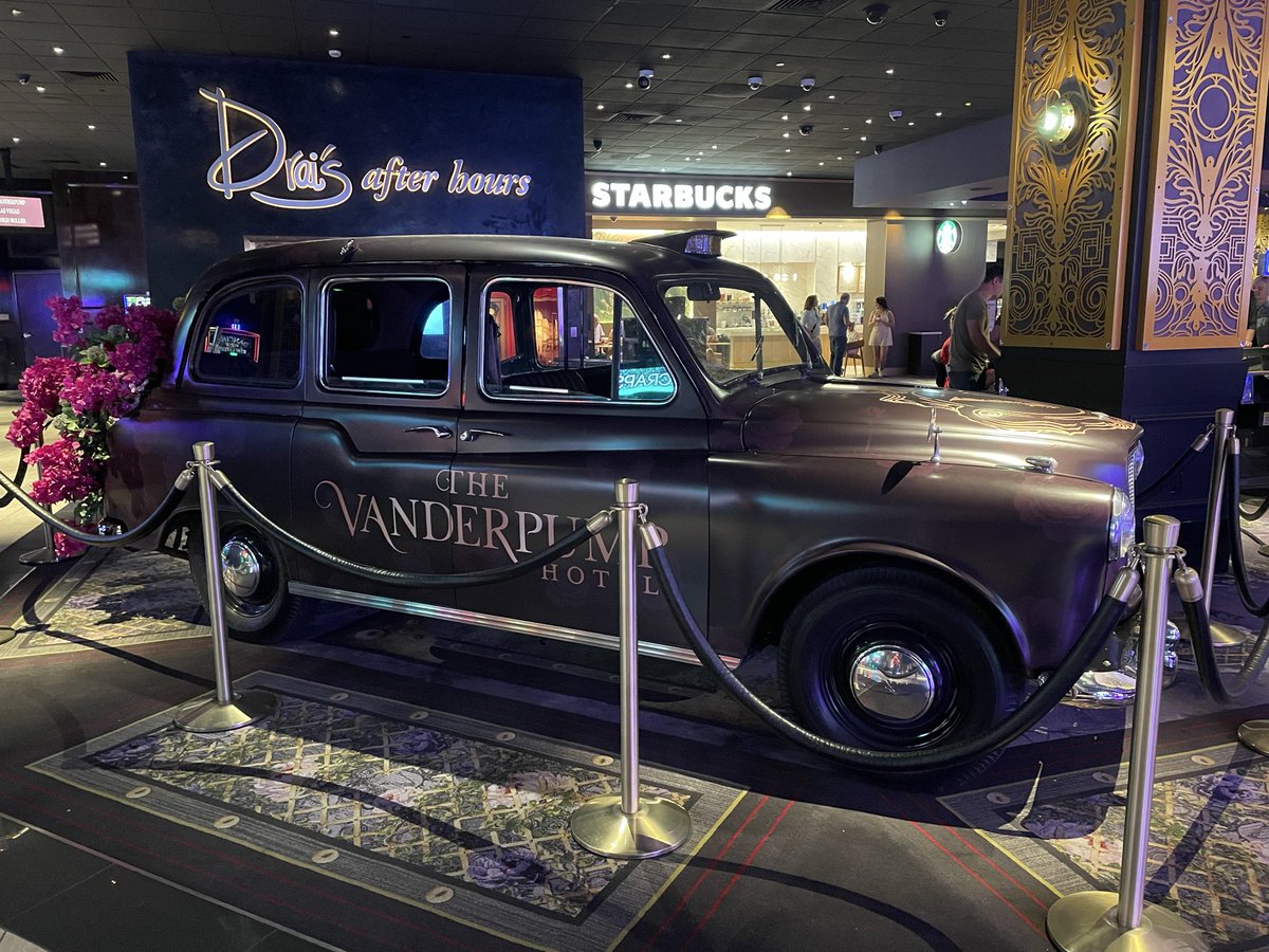 Maverick_TC's tweet photo. @MtM_Vegas Vanderpump hotel updates. Classic car in the front of the casino, draped flowers on the light fixtures in the bar lounge area, and new chairs. https://t.co/Om2mZmVwdj