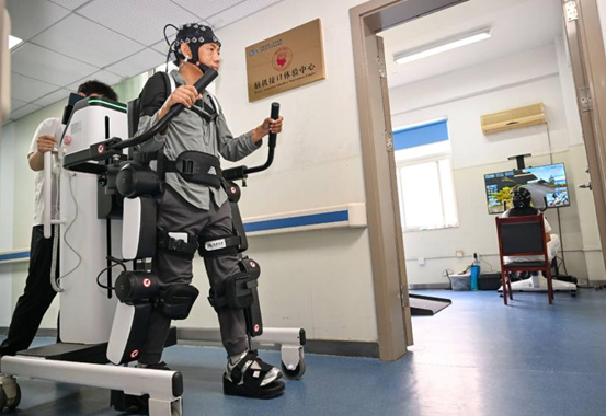 ChinaScience's tweet photo. Technology opens new doors to accessible living

Recent advancements in technologies like artificial intelligence (AI), brain-computer interfaces and bionic engineering are offering renewed hope and expanding possibilities for people living with disabilities.

China's 2025 statistical bulletin on the development of the cause of people with disabilities reported that 1.487 million people with disabilities received basic assistive devices last year.

For 51-year-old Xu Min from Suzhou, east China's Jiangsu province, technology has done more than improve daily life; it has restored her confidence and sense of possibility.

She still feels emotional recalling her victory in the upper-limb prosthetics category at the Cybathlon, often called the "Olympics for assistive technology."

Xu lost her right hand and wrist in a workplace accident over thirty years ago. "It felt like my whole world had collapsed," she recalled, crediting her family's encouragement for helping her regain the courage to move forward.

In 2019, staff members from the Suzhou Disabled Persons' Federation contacted Xu about a new project being developed by a research team from Southeast University. The team was developing a prosthetic hand capable of movement and asked whether she would be willing to test it. Xu agreed immediately.

"We use sensors attached closely to the skin to collect myoelectric control signals from the residual limb," explained Hu Xuhui, a member of the research team. "In simple terms, the signals convey the user's intended movement to the chip, which then transmits commands to the prosthetic hand, completing the movement loop."

Xu vividly remembers the first time she saw the prosthetic hand move.

"I cried out in excitement," she said. Initially, success rates were low, but persistent training steadily improved coordination between Xu and the device.

In early 2024, Hu brought another piece of good news: the Cybathlon competition would soon be held. As Xu prepared for the competition, the research team continued refining the prosthetic device and improving its performance.

At the finals in Switzerland, Xu excelled, completing challenging tasks like hammering and nail removal. She was the sole contestant to master the "tactile bag" challenge, identifying and retrieving specific objects by touch alone using the prosthetic.

"Remarkably, the prosthetic allowed me to perceive my environment with precision. It came very close to the functionality of a real human hand," Xu stated proudly after her win. "Technology gave me hope again."

Technology has also helped restore hope to Jin, a resident of Lanxi in Jinhua, east China's Zhejiang province.

Jin suffered complete paraplegia after a nearly 10-meter fall while repairing his roof in October 2024. Even after four months of rehabilitation, he could not lift his legs or regain normal bladder and bowel control.

At a time when he had nearly lost hope, his daughter, Jin Xiaofang, learned that the Second Affiliated Hospital of Zhejiang University School of Medicine was recruiting volunteers for a closed-loop spinal neural interface implantation procedure. She immediately took her father there for evaluation.

In March 2025, the medical team successfully implanted spinal stimulation electrodes into Jin's lumbar spine and placed a wireless, rechargeable stimulation controller (roughly matchbox-sized) in his abdomen.

The domestically developed "neural pacemaker" measures just 51 millimeters in length and weighs only 18 grams. Using Bluetooth technology, it receives instructions from external devices and delivers precise electrical stimulation to damaged areas of the spinal cord. Patients can recharge the device simply by placing a charging coil near the abdomen, with a single charge lasting more than a week.

Fifteen days after surgery, Jin successfully achieved standing and walking movements. One month later, he regained the ability to take steps with the assistance of a walker.

The technology not only improved his motor functions, but also demonstrated potential for repairing neural sensory pathways.

So far, the hospital has used the closed-loop spinal neural interface technology to help more than 10 spinal cord injury patients regain varying degrees of physical function, with several progressing from being bedridden to walking again.

Another beneficiary of technological innovation is Qing Jingwen from Mianzhu, southwest China's Sichuan province, a survivor of the 2008 Wenchuan Earthquake.

Trapped beneath rubble for nearly 70 hours during the earthquake, Qing eventually lost her right leg above the knee and suffered severe injuries to her left leg. For years afterward, walking remained one of the greatest challenges in her life.

In spring last year, through a public welfare program supported by the Chengdu Foundation for Disabled Persons, Qing received an intelligent bionic leg developed by BrainCo, a Chinese neurotechnology company that develops brain-computer interface products.

"Ever since I started using the intelligent bionic leg, I haven't fallen once," Qing said with a smile.

According to Wang Yong, sales director for intelligent prosthetics at BrainCo, the device integrates gyroscopes, position sensors and multiple other sensors to collect real-time data. The information is processed through algorithms and converted into instructions that control the prosthetic's hydraulic system, allowing it to adapt instantly to different movements and enabling users to achieve a near-natural gait and walking freedom of movement.

Beyond advanced functionality, this domestically developed intelligent bionic leg is significantly more affordable than comparable imported products. With steadier steps and renewed confidence, Qing has begun exploring new possibilities in life. Last year, she traveled to Yueyang, central China's Hunan province, to work as a volunteer teacher and even helped her students establish a cultural and creative arts club.

"The warmth of technology has made both my steps and my heart steadier," Qing said. "I believe my future will become broader and brighter." (By Yao Xueqing, Dou Hao, Li Kaixuan, People's Daily)