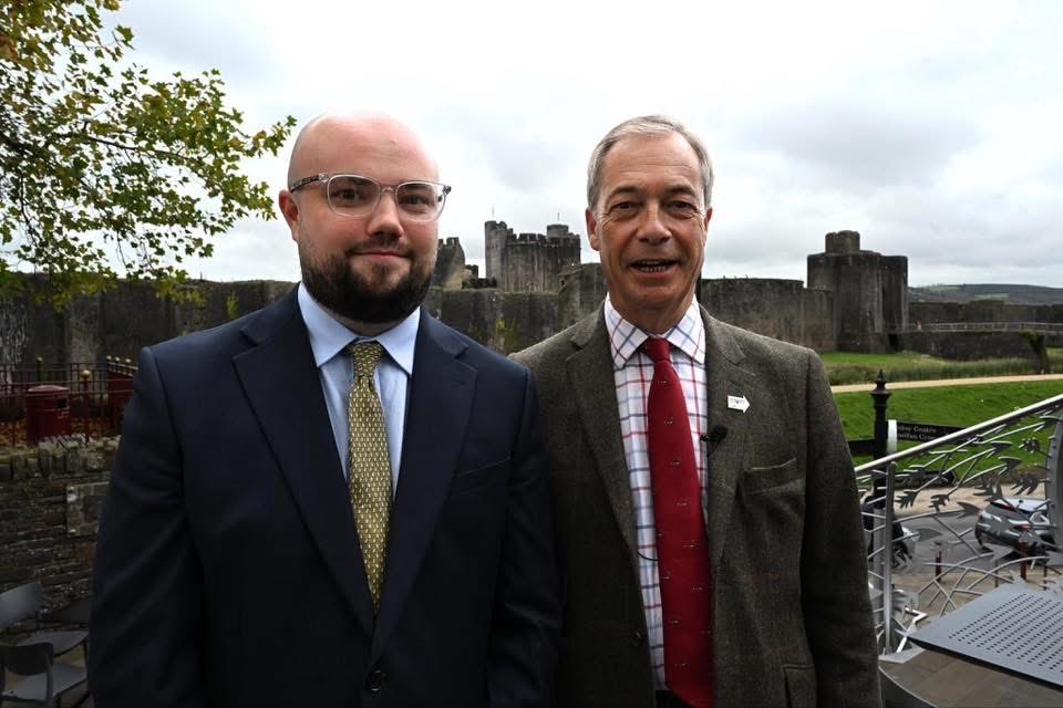LlyrPowell's tweet photo. 15 years between these two photos with Nigel Farage a reminder of how far the movement has come and how much the political landscape has changed.

Fifteen years on, the challenges may look different, but the belief in this country and its people remains the same. https://t.co/8XbBZXOAo3