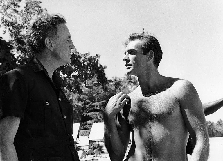BondinColour's tweet photo. Ian Fleming and Sean Connery chat during Dr No filming. They met a number of times and I do wonder what Connery thought of being described by Fleming as a “roughneck”. Just goes to show any new Bond actor will have their critics! #jamesbond #seanconnery #ianfleming #drno https://t.co/ll498gbW5s