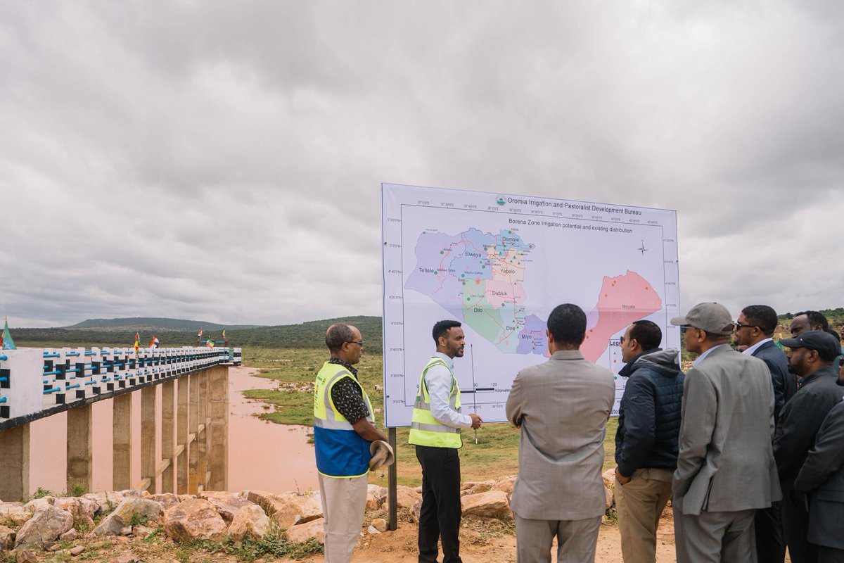 AbiyAhmedAli's tweet photo. Securing water infrastructure remains a key milestone in building resilience, marked by the completion of irrigation dams under the Finna Oromia Irrigation Projects in Gomole Woreda of Borena Zone. In Dese Gora, for example, this critical infrastructure has created a massive water storage capacity of more than 190 million cubic meters, ensuring a reliable and sustainable water supply. The projects have the potential to irrigate over 14,500 hectares of agricultural land, directly supporting households, strengthening food production, and securing water resources for livestock.