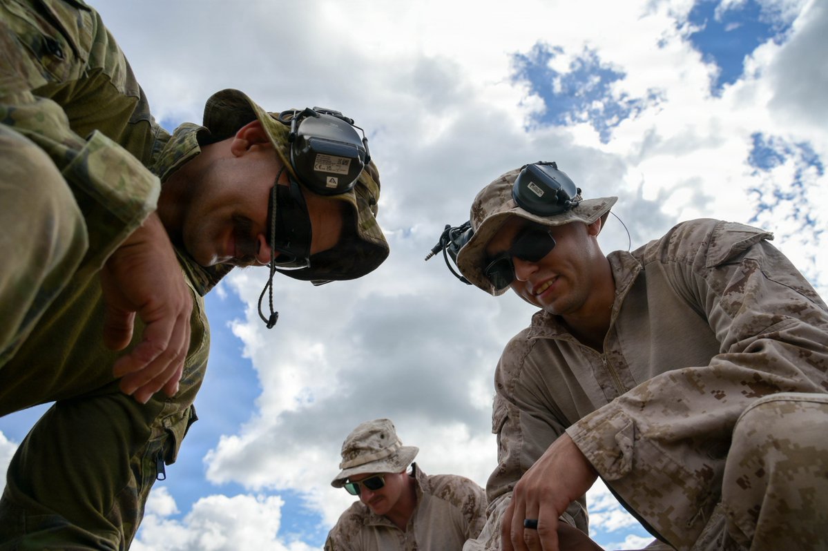 1stMEF's tweet photo. Australian army and U.S. Marines with @MRFDarwin, conduct demolition drills during Wallaby Walk, May 10, 2026. 

Wallaby Walk is a two-week training exercise to certify explosive ordnance disposal teams for operational requirements against current and emerging threats. https://t.co/sz7GY6ftcB