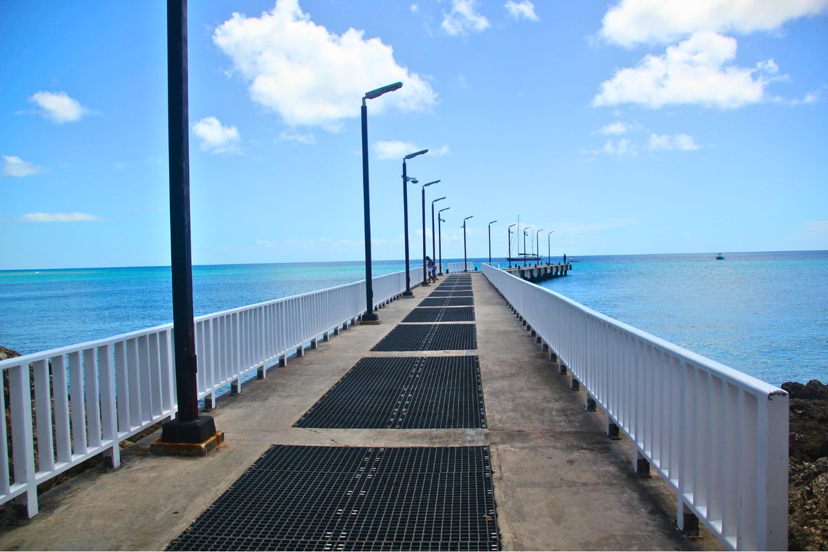 BoardwalksBB's tweet photo. 😎 Standing at the edge of the Speightstown jetty, the ocean stretches out in a calm blue arc… and just a turn inland reveals the Parish Church, the colourful bandstand, and the ever‑iconic Fisherman's Pub anchoring the town's charm: https://t.co/94RSeSdscv 
#barbados https://t.co/CMr9ESqOfz