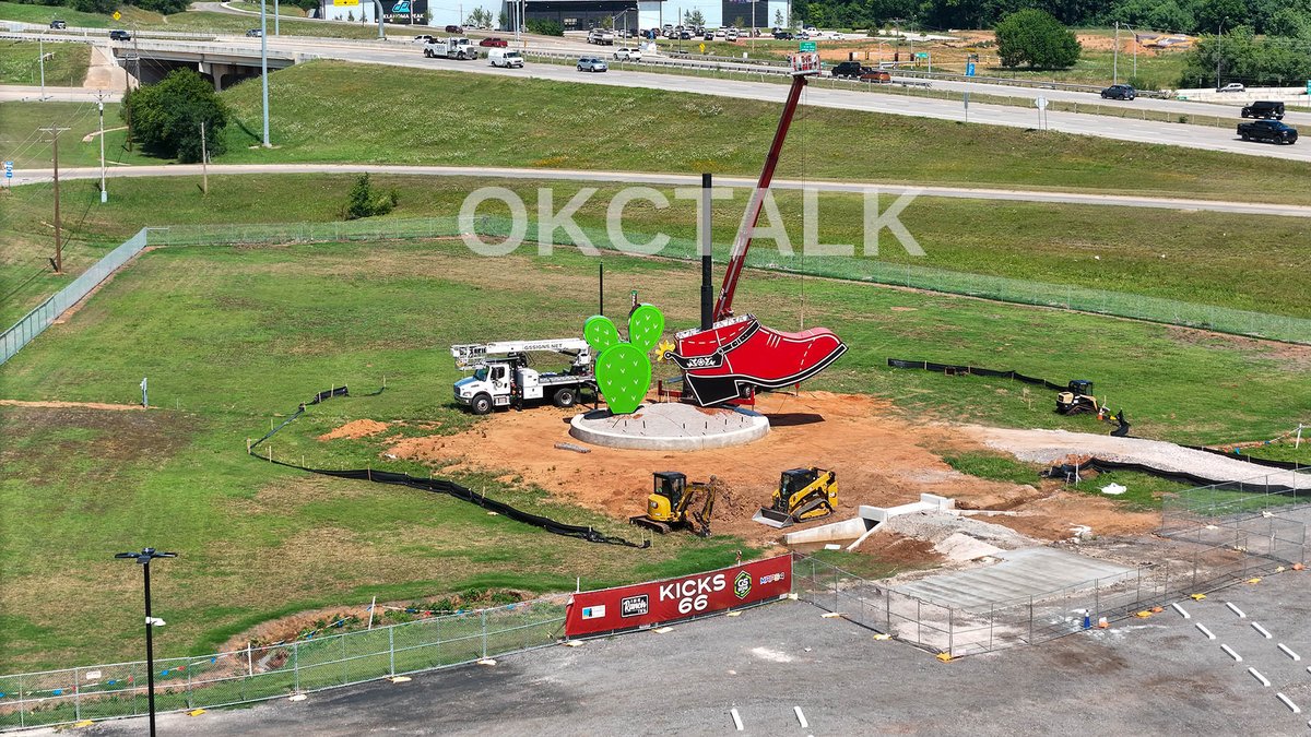 OKCTalk's tweet photo. Installation is almost complete on "Kicks 66", a massive 35-foot-tall, illuminated red cowboy boot sculpture in Oklahoma City celebrating the 100th anniversary of Route 66.

Designed by local artist Cameron Eagle, the 6-ton aluminum monument features the stitched lyric, "Oklahoma City Looks Mighty Pretty"

The location is just east of the @ncwhm  National Cowboy and Western Heritage Center near NE 63rd and MLK Boulevard.