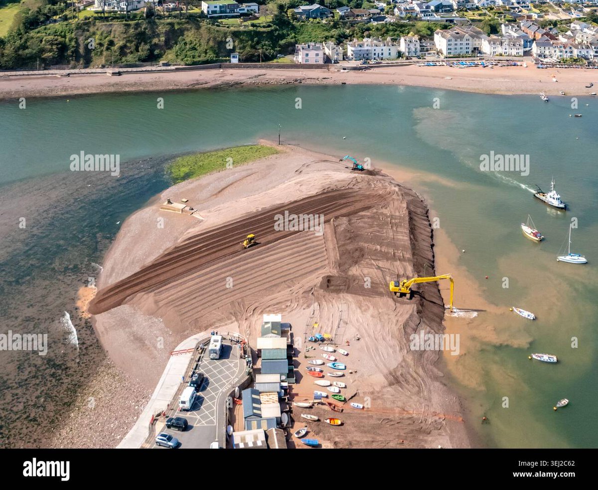 PureGlowMedia's tweet photo. Teignmouth, UK. 27 May 2026. Aerial photographs show ongoing coastal management works on Teignmouth beach, where sand is being re-profiled and moved back into its charted position. #Teignmouth #Devon https://t.co/eu7qwcztDe https://t.co/JvQwDpZMo1