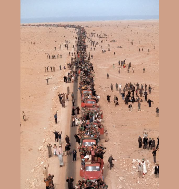 AfricanHub_'s tweet photo. In 1975, more than 300,000 Moroccans took part in the historic “Green March,” a massive peaceful demonstration into Western Sahara aimed at ending Spanish control over the territory.

On November 6, around 350,000 unarmed Moroccan civilians, supported by roughly 20,000 troops, marched across the border carrying Moroccan flags, copies of the Quran, and portraits of King Hassan II. The carefully orchestrated event was designed to pressure Spain into handing over the territory without armed conflict.

The march occurred at a critical moment, just weeks before the death of Spanish dictator General Francisco Franco. On November 14, Spain, Morocco, and Mauritania signed the Madrid Accords, formally transferring administrative control and effectively bringing an end to nearly a century of Spanish colonial presence in the region.

The issue remains unresolved to this day. The Algeria-backed Polisario Front rejected the agreement and declared the Sahrawi Arab Democratic Republic in 1976. A UN-brokered ceasefire was signed in 1991, but Western Sahara continues to be one of the world’s longest-standing territorial disputes, with the promised referendum on self-determination still unheld due to disagreements over voter eligibility.