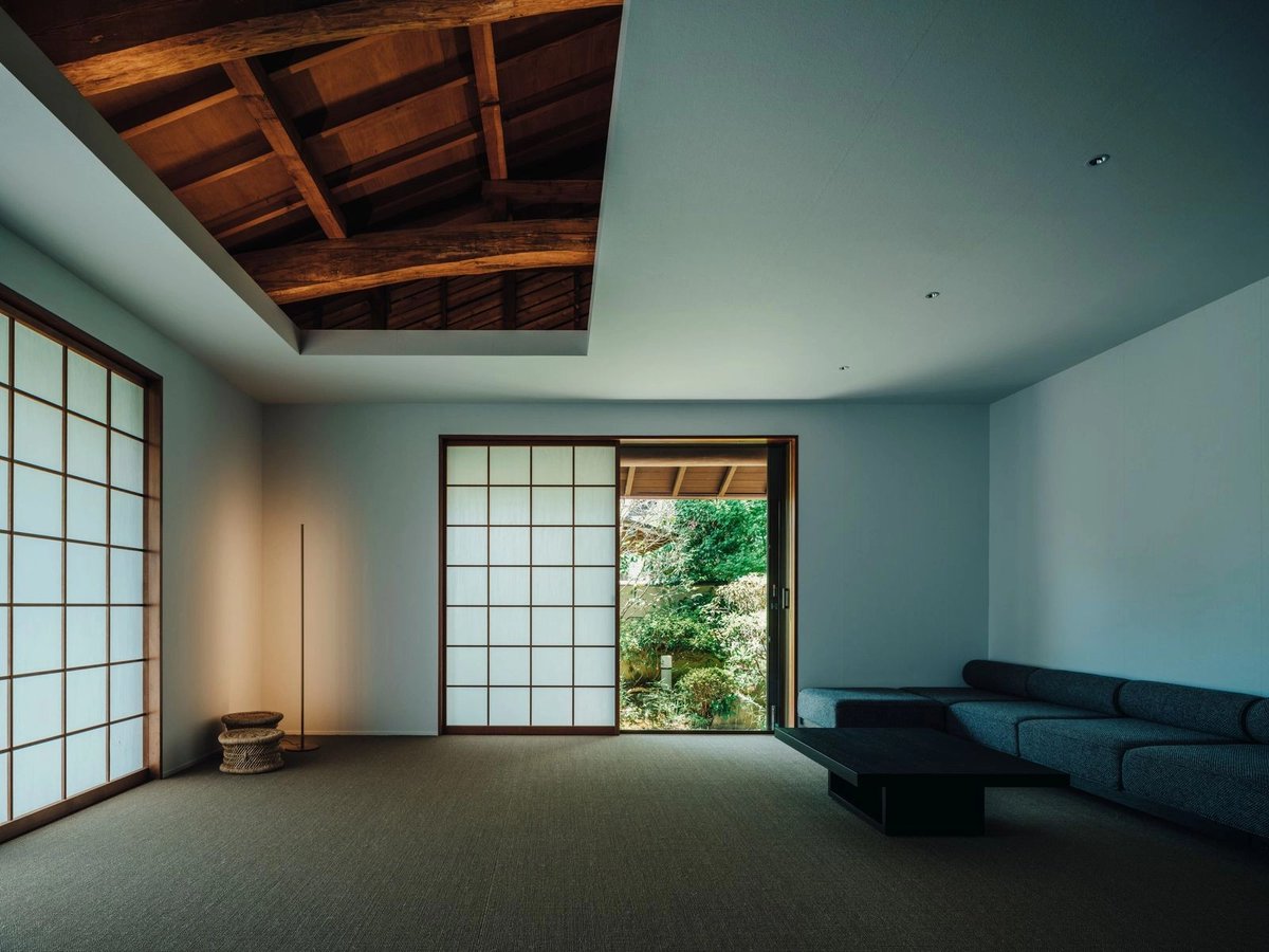 tatamispaces's tweet photo. A 34-year-old house in Hatsukaichi, Hiroshima — corner lot, hilltop, views of the Seto Inland Sea and Miyajima to the south. Designed by ure, completed 2024.

The new owners are the third family to live here. The house was solidly built and well cared for; it didn't need to be remade. The architects added new shoji, made careful material choices, and opened up the roof structure overhead — the small-scale timber framing of the 小屋組 now visible, creating a layer of space that wasn't there before.

No structural changes. The house will keep adjusting as the family settles in.

📷 Tatsuya Tabii via https://t.co/ht4GqPjOdt