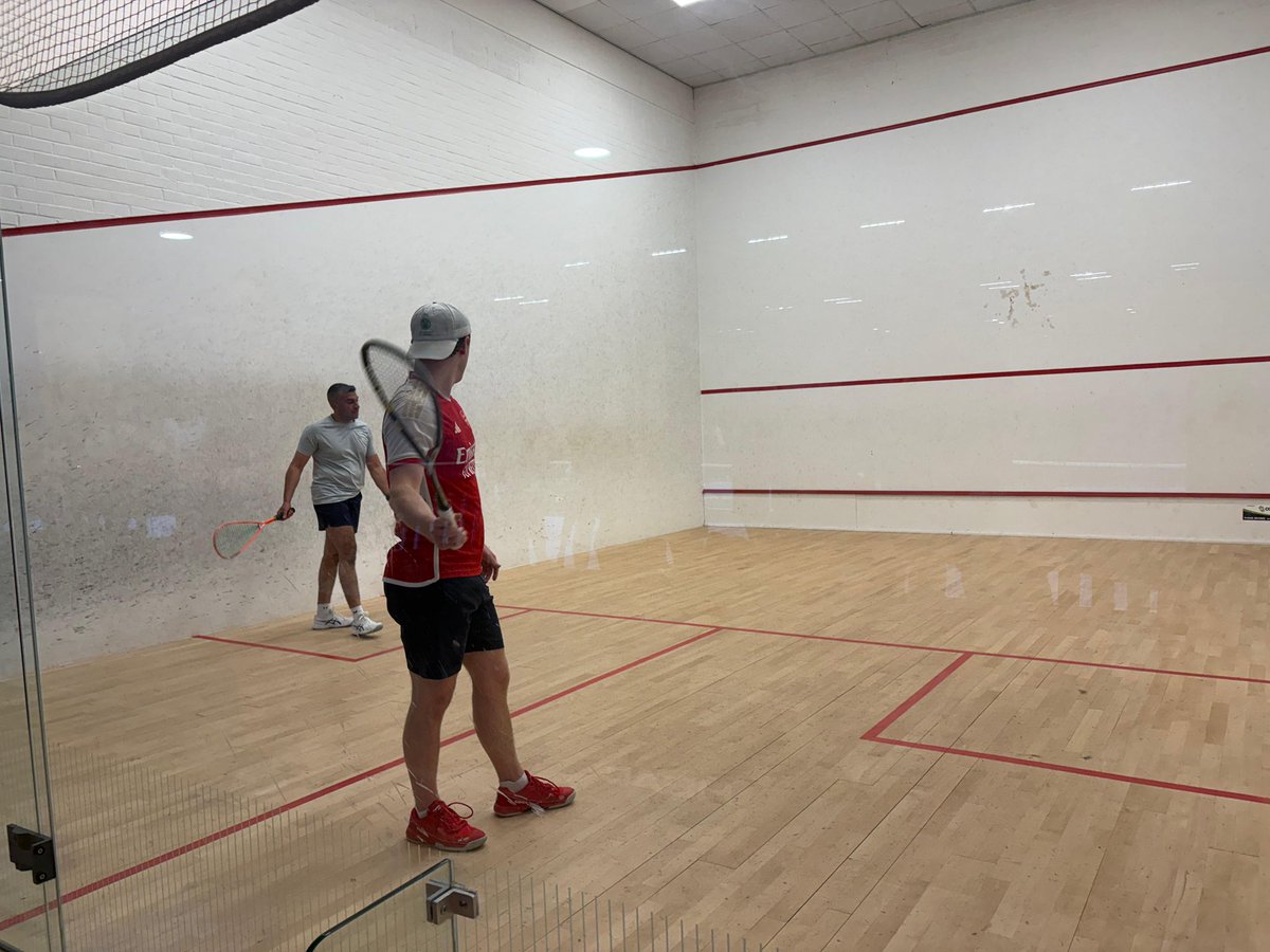 henleysquashman's tweet photo. Henly 3rd team's Miles Edwards (baseball cap) receiving serve. https://t.co/y457EtKWFQ