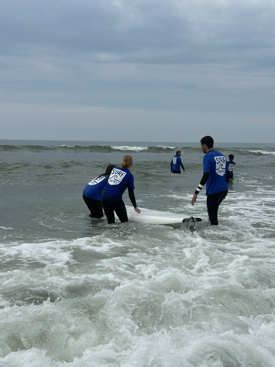 Kellenberg's tweet photo. Surf For All, a nonprofit organization based in Long Beach, is dedicated to helping individuals with disabilities experience the joy of the ocean. 

Today, Surf For All hosted students from the Life Skills program at Long Beach High School, and the Kellenberg Surf Club was honored to join the session alongside the Long Beach surf team. Our students served as surf instructors, helping introduce these students to the waves and creating an unforgettable day at the beach.