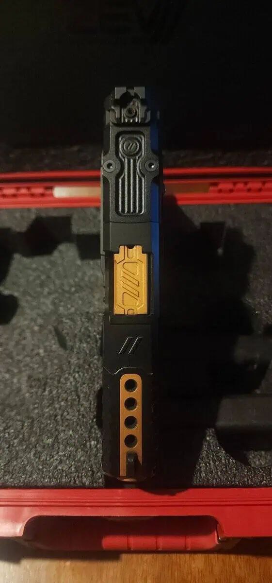 TacticalShit's tweet photo. Zev OZ9C Hypercomp — Record entry.

Modular platform with Glock 19 Gen 3 base, Glock 17-style frame option, and slide cut for an RMR footprint optic. Includes two 15-round Magpul magazines. Logged for record use, May 2026. https://t.co/DF50yt9vfZ