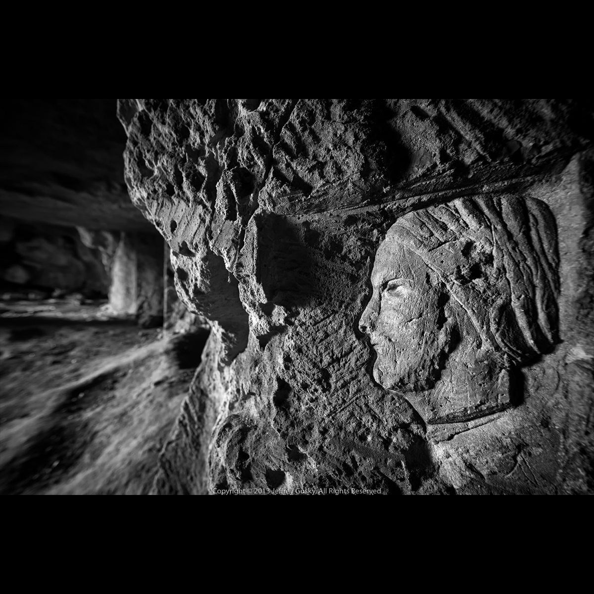 hiddenwwi's tweet photo. Carving found near entrance to a German WWI underground city that seems to go on and on and on. These spaces pre-existed WWI by centuries. They were the quarries from which stone for castles, cathedrals and homes was mined. 
#ww1 #blackandwhitephotography https://t.co/6q1RK0x3AO