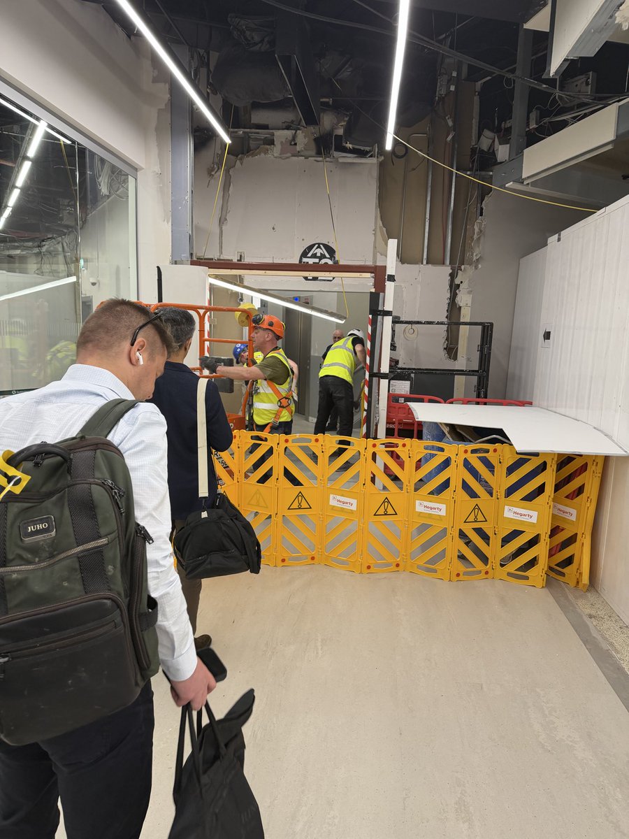 barrykd's tweet photo. @DublinAirport - this is our view and roadblock going from T1 to T2. A great construction safety example. At least the guys had a good laugh. Do better. https://t.co/QkhWs6Xqdu