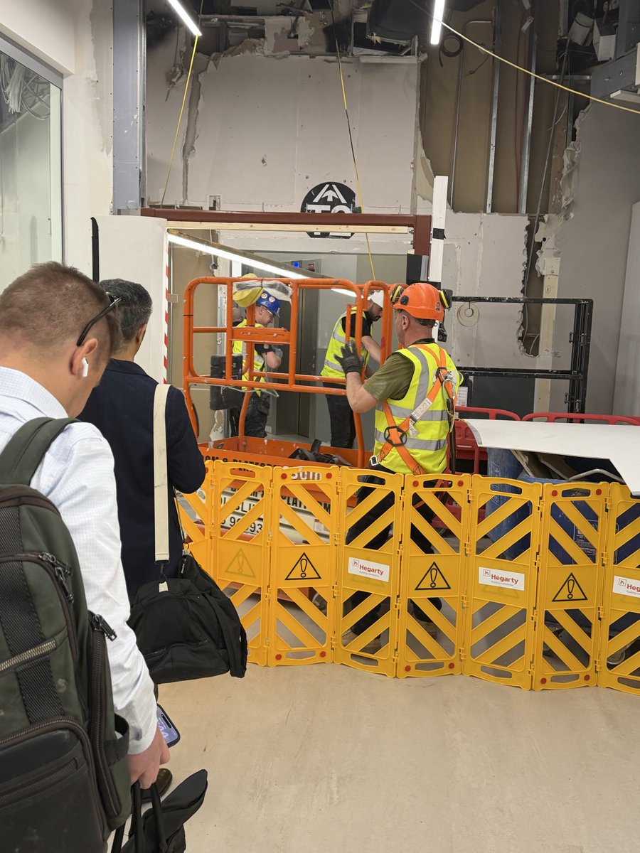 barrykd's tweet photo. @DublinAirport - this is our view and roadblock going from T1 to T2. A great construction safety example. At least the guys had a good laugh. Do better. https://t.co/QkhWs6Xqdu
