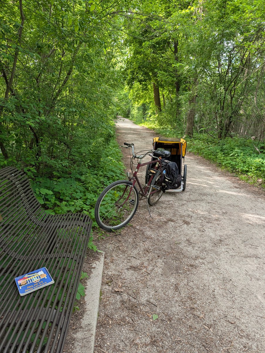 theramblingfool's tweet photo. I was totally wrong. On my first bike ride with my baby in the new bike trailer, we came across a Little Free Library along our wooded bike trail. There were some baby books inside, so we took a break to read. She loved it.

Touching grass softened this Twitter-hardened heart. https://t.co/xmes7vk17a