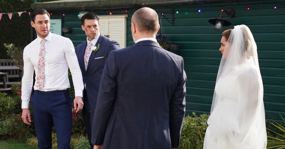 RadioTimes's tweet photo. This #EastEnders wedding will go down in the soap history books!

In tomorrow's episode, as Vicki desperately tries to explain herself, Ross rushes out of the marquee and punches Zack!

📸 BBC/Jack Barnes/Kieron McCarron https://t.co/2QpYtuTfbn