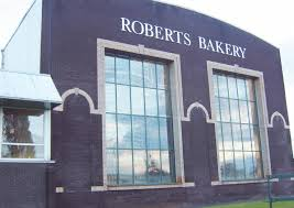 AllForProgress_'s tweet photo. Britain may have to say goodbye to another piece of its history this month. Roberts Bakery, a family bakery in Northwich, Cheshire, has filed notice to appoint an administrator. 

The bakery was founded in 1887. It has fed the working population of mid-Cheshire for 139 years, through two World Wars, the Great Depression, post-war rationing, decimalisation, every monarch since Victoria, and the construction of every supermarket within 20 miles of its front door. It has not survived the regulatory environment of the past five.

There is no single villain in this story. There is, instead, the cumulative arithmetic of a particular kind of small British enterprise: 

- A National Insurance contribution rise that adds a percentage point to every wage paid.
- Energy bills that have not returned to anything resembling pre-2022 levels and may not before this generation of bakers retires.
- A supermarket procurement system that prices its bread in pennies and pays its suppliers in fractions of pennies.
- A minimum wage applied uniformly to a London consultancy and to a family business in Cheshire that does not have a corporate-services department to absorb the increase. 

Each of these measures was, at the time of its introduction, defended on respectable economic grounds. The combined effect, on a margin like Roberts', has been to make the arithmetic of continuing in business slowly, then suddenly, impossible.

This is what the country is losing. The quieter kind of business - it's not like Roberts has been any kind of household name outside Cheshire - the kind that runs without fanfare, that employs forty or fifty people in a single town, that supplies bread to local schools and care homes and corner shops, that was passed down inside a family across four or five generations because the children grew up smelling flour. 

The country has 1000s of these concerns, anchors of local culture and economy. It used to have 10,000s. We have now, on present trajectory, maybe another decade of the remaining ones before the same arithmetic comes through them.

My position on this is uncomplicated. The combination of policy choices that has produced the closure of Roberts Bakery is a policy choice. It can be reversed. 

The National Insurance rise on small employers can be reversed, and must be. Energy costs will be brought down through domestic capacity. And the minimum wage will be applied with the small-enterprise differential that every other developed economy applies. 

The British family bakery, given a different regulatory environment, can continue to work.

In the meantime, the ovens at Northwich will, in their own time, go cold. The Roberts family, having done what they could, will move on to whatever 5th generation bakers, and retired pillars of disbanded communities, are expected to do next. 

And the country, as it has done so often in the past five decades, will mourn the loss of the institution without being shown - by any major party - how the closure was actually arranged.