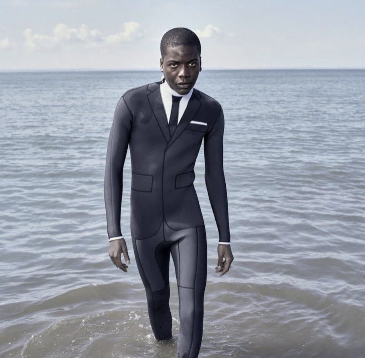 HardestFitPics's tweet photo. Thom Browne Trompe L'Oeil wetsuit this technical neoprene suit is designed to look like a tuxedo https://t.co/E2W8Osm4f2