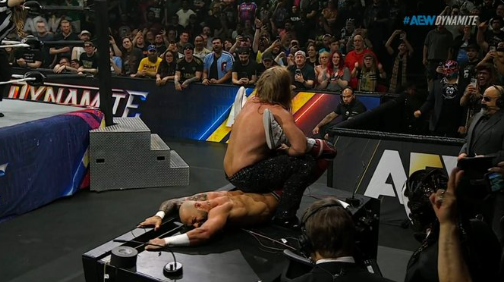 SixtyMinuteDan's tweet photo. They did a callback to 25 years ago (May 21, 2001) when Jericho put HHH in the walls of jericho on the announce table after the torn quad in San Jose.  @davemeltzerWON  @bryanalvarez https://t.co/XbOEONiWJJ