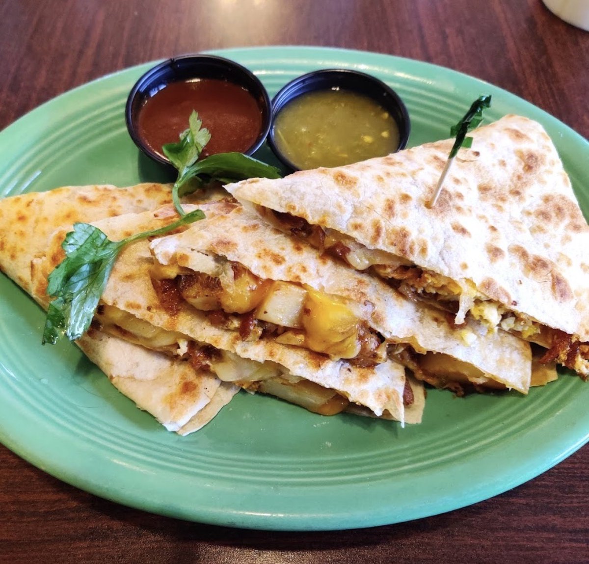 stansmaplecafe's tweet photo. Our breakfast quesadilla always hits the spot! Made with scrambled eggs, bacon, green onion, and house potatoes, plus jack and cheddar cheese, in a crisp flour tortilla. So good! 🤩 https://t.co/aTfGLDNDK7