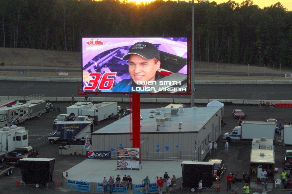motionrocket's tweet photo. One of our Motorsports installs at @DominionRaceway showing live race coverage with data, driver headshots with sponsorship, and branding graphics. https://t.co/8zvdAfiTLE