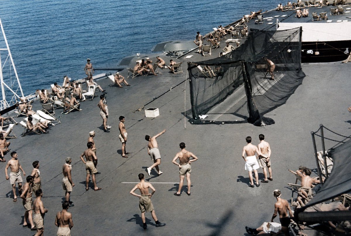 WG_RumblePants's tweet photo. Australian servicemen, many recently liberated ex-prisoners of war, playing cricket on the flight deck of the Royal Navy aircraft carrier HMS Formidable in November 1945. The ship had previously been active with the British Pacific Fleet. https://t.co/yiFJD49dfy