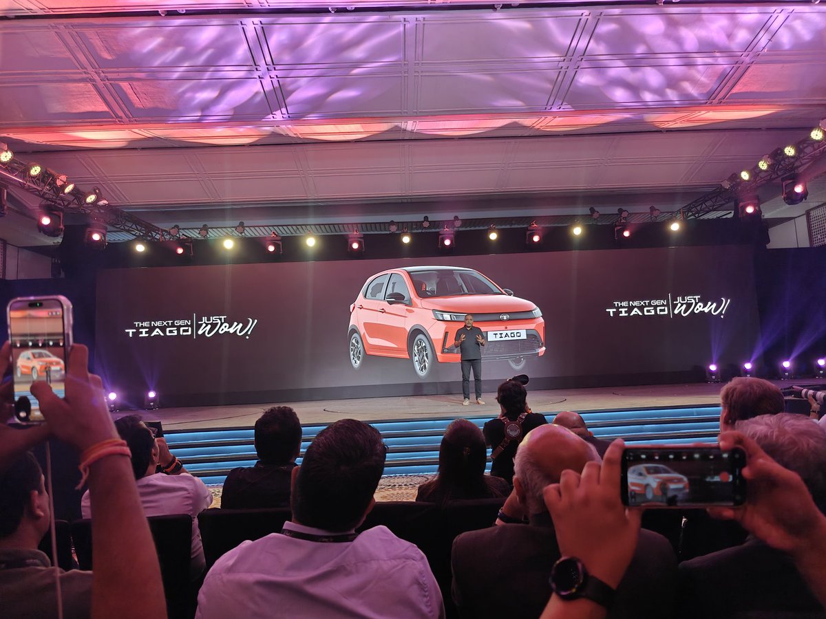 VahanWarta's tweet photo. The next-gen Tiago is clearly aiming to redefine what buyers should expect from an entry hatchback ⚡

✨ Modern silhouette
✨ Fabricia Luxe dashboard
✨ Connected tail lamps
✨ Premium layered interior design

But Tata didn’t stop at just looks 

✅ 360° Camera
✅ Blind View Monitor
✅ Auto-fold ORVMs
✅ Rear AC vents
✅ Wireless charging
✅ ESP with Traction Control
✅ 6 Airbags as standard

And the biggest highlight?
Tata is building an entire Tiago family now:

⚡ Tiago.ev
⛽ Tiago Petrol
🌱 Tiago iCNG

“A Tiago for Everyone” perfectly sums up the strategy 🎯

This no longer feels like just a budget hatchback. Tata seems to be positioning the Tiago as a small car with a much bigger-car experience 👀

#TataTiago #TheNextGenTiago #JustWOW #Tiago2026