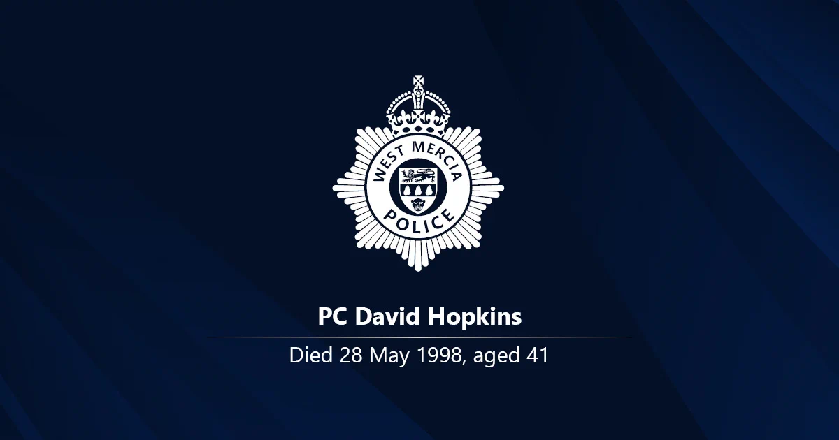 White West Mercia Police crest on a dark background with the name PC David Hopkins and the words: Died 28 May 1998, aged 41