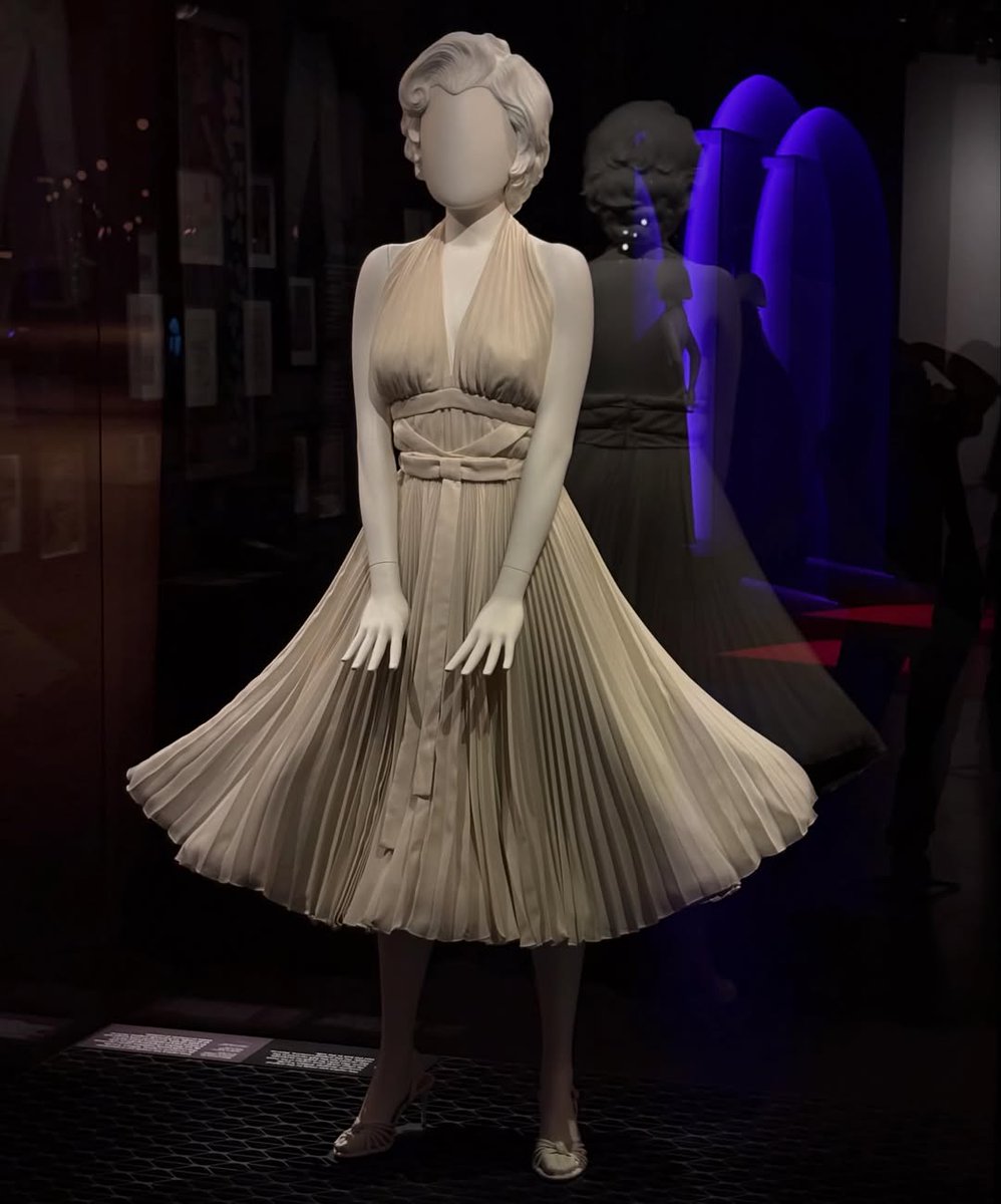 RottenTomatoes's tweet photo. First look at Marilyn Monroe’s iconic dresses from ‘Gentlemen Prefer Blondes’ and ‘The Seven Year Itch.’

These dresses and more are on display in the Marilyn Monroe: Hollywood Icon Exhibition. Opening this Sunday at the Academy Museum. https://t.co/JakSJApO0B