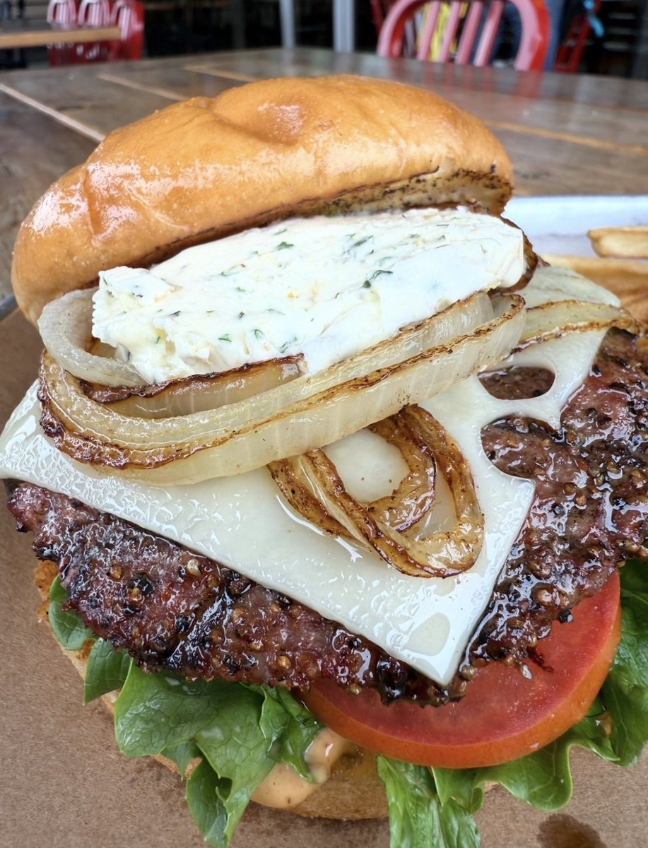 StilesSwitchBBQ's tweet photo. 🍔 #NationalBurgerDay x Smoked Brisket Burger Thursday at Stiles Switch BBQ. 

💥 The Steakhouse Smoked Brisket Burger - Swiss Cheese, Carmelized onions, Chipotle &amp; Garlic Sauce, &amp; Topped w a house made Bone Marrow &amp; Roasted Garlic Compound Butter. Homemade Onion Rings or Fries. https://t.co/s9XKLI4vyK