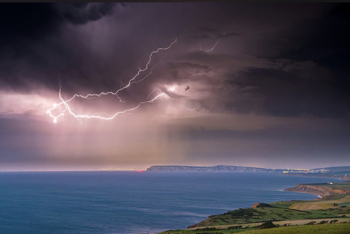 Bran509's tweet photo. Such a brilliant photographer, just look what Jamie at Island Visions Photography caught last night, looking across the islands West coast and from Yarmouth.
@ilovecowes @MikeCoxCowes @Kat14041 @HIOWweather1 @BBCSouthWeather @itvweather @AlexisGreenTV @bbcweather @BBCWthrWatchers 

#isleofwight #theneedles #photography #weather #lightning