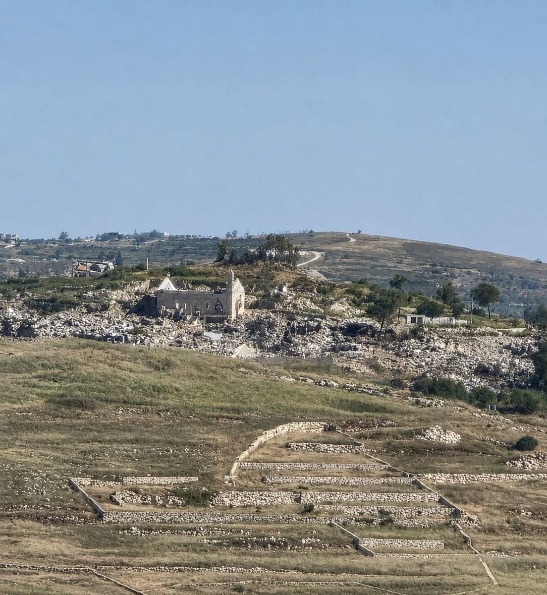 AMK_Mapping_'s tweet photo. The Christian quarter of the historic IDF-occupied southern Lebanese town of Yaroun has received heavy damage from Israeli controlled demolitions, with centuries-old homes and the local church either being destroyed or receiving heavy damage. https://t.co/GF10MnnvIu
