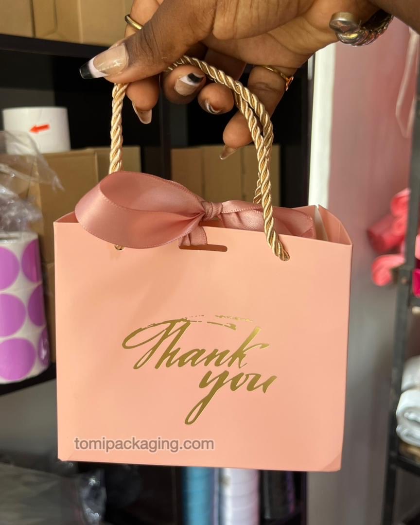 TomiPackaging's tweet photo. Thank You Paper Bag

Shop on the website. Search “Thank You Paper Bag”
TomiPackaging￼.com

✨ Details
Small 14*6*12cm
800 naira each
Colours : White, red, pink, black

How to order ⬇️⬇️

➡️ Place your order directly on the website TomiPackaging￼.com
➡️ For Branding Orders select branding as an Extra and we will contact you 
➡️ If you don’t know how to order, check our pinned post for a detailed tutorial.

For more information, please contact us on WhatsApp +234 815 680 9610

https://t.co/IQuoohuda3
