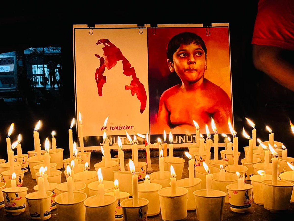 TamilGuardian's tweet photo. 🪔 JNU vigil honours victims of Tamil genocide

Students and activists at Jawaharlal Nehru University (JNU) in New Delhi observed Tamil Genocide Remembrance Day on 18 May, joining Tamils across the world in remembering the tens of thousands massacred by the Sri Lankan state.

Participants lit candles in remembrance during a vigil, as attendees gathered in tribute to the victims of the Mullivaikkal genocide.

Posters, memorial messages and candles were part of the observances, with participants paying homage to those killed by the Sri Lankan military offensive supported by several nations including India.
